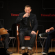 Daniel Craig, center, scheming with a beverage as Sam Mendes, right, basks in the actor’s boozy power.